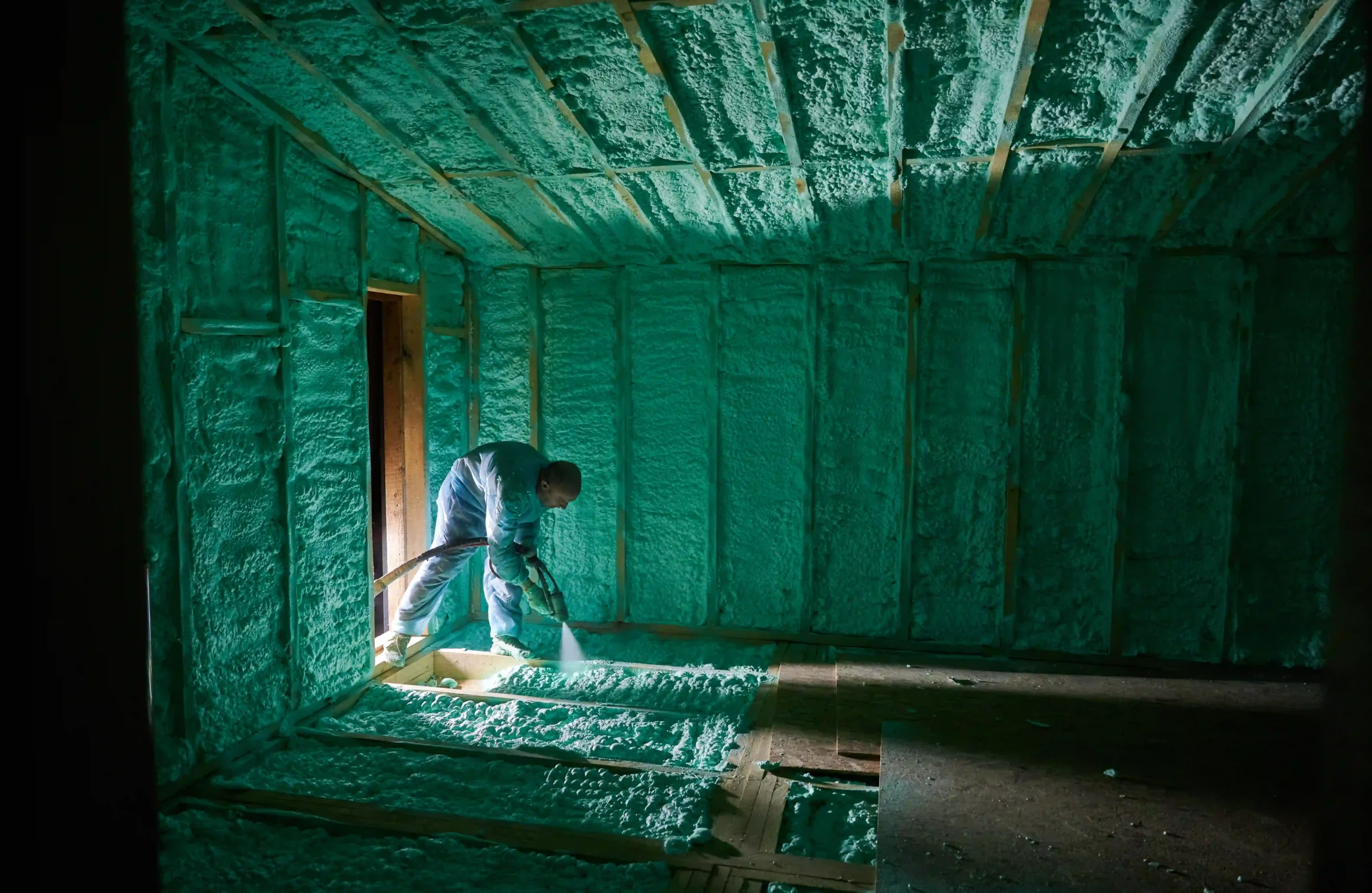 worker-spraying-polyurethane-foam-for-insulating-w-2023-11-27-04-52-51-utc